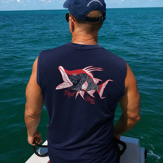 Model wearing navy performance Hogfish sleeveless shirt with the text "Reel Hog"