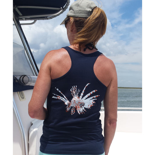Model wearing women’s navy racerback tank with lionfish design and Reel Fishy Spears logo on front