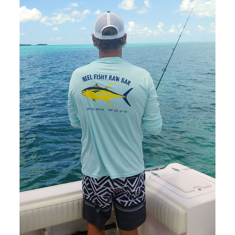 Fisherman wearing Reel Fishy Raw Bar Tuna Performance Dry-Fit Long Sleeve - Seagrass