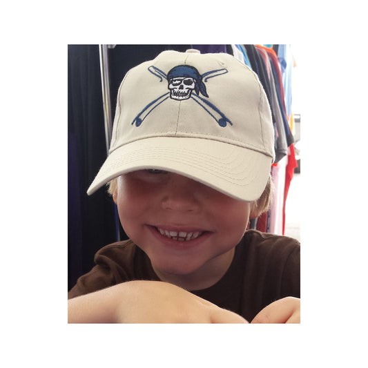 Youth wearing khaki fishing hat with Reel Fishy Pirate Skull and Rods logo
