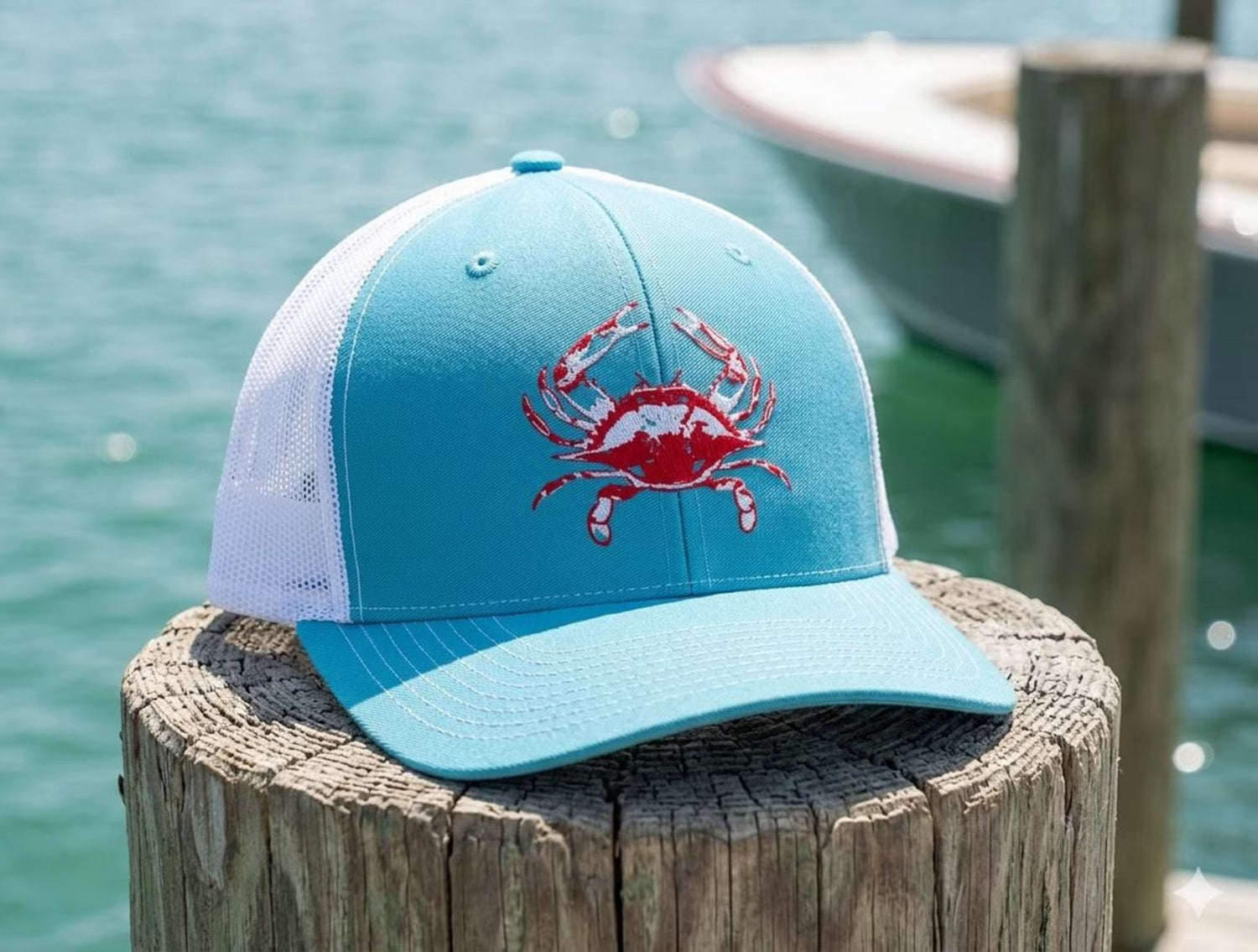 Reel Fishy trucker hat with embroidered Blue Crab design