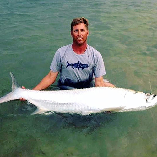 Fisherman catching a tarpon and wearing Men's Cotton Tarpon T-shirts