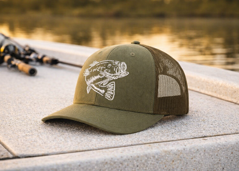 Bass olive trucker hat, Richardson 112 style on a boat