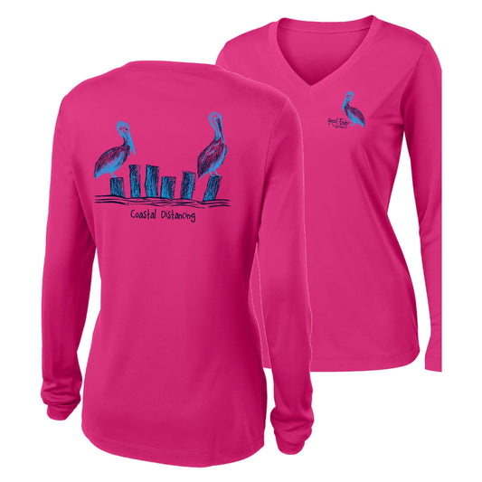 Women’s raspberry long sleeve performance shirt, V-neck, pelicans "coastal distancing" design on back, and Reel Fishy Pelican logo on front