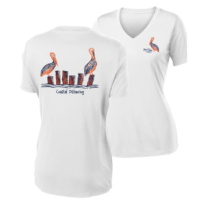 Women’s white short sleeve performance shirt, V-neck, pelicans "coastal distancing" design on back, and Reel Fishy Pelican logo on front