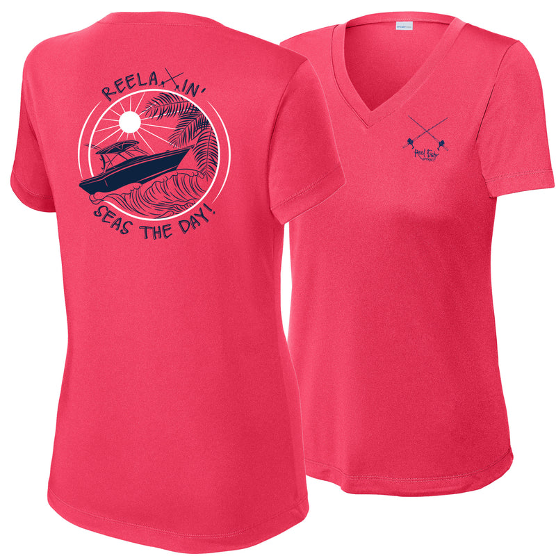 Ladies coral short sleeve V-neck performance dry-fit shirt with Reelaxin’ – Seas the Day logo on the back and Reel Fishy Salt Rods logo on the front.