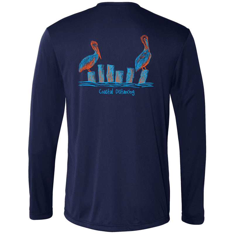 Unisex navy long sleeve performance shirt with 50+ UPF, Coastal Distancing pelican graphic on back, Reel Fishy logo on front.