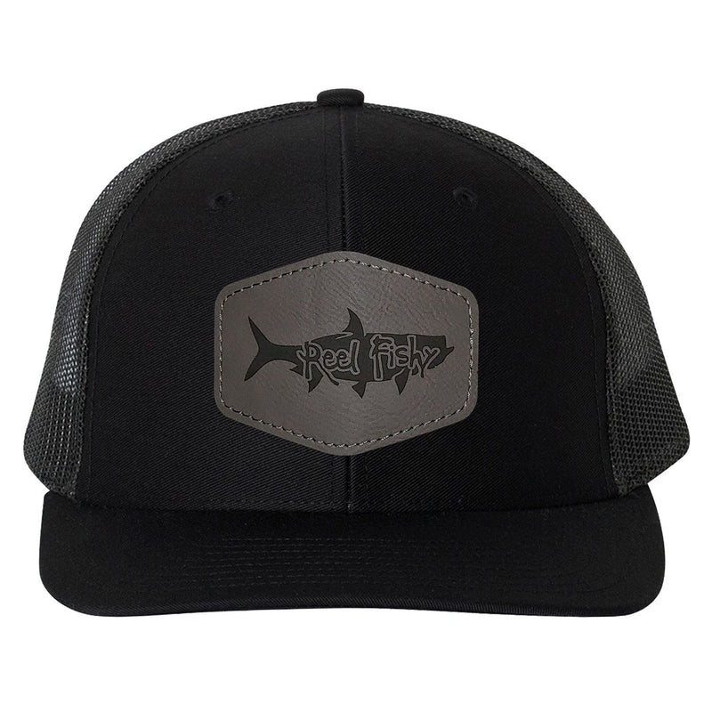 Reel Fishy Tarpon leather silver patch on Richardson Black/Charcoal mesh trucker hat