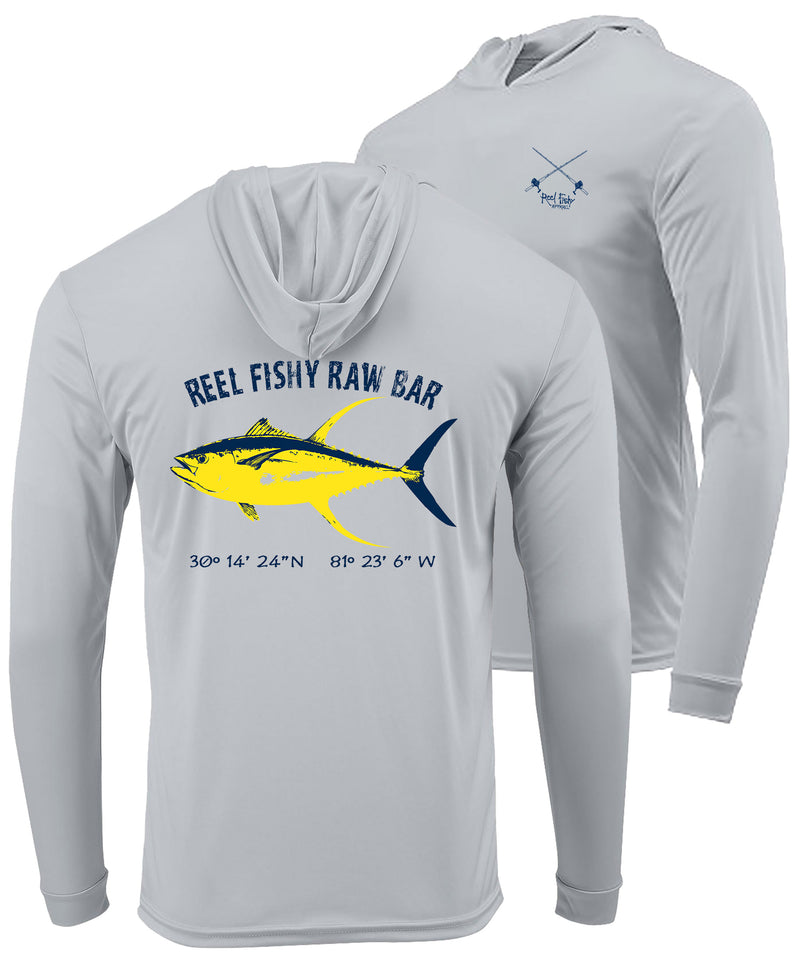 A light gray long-sleeve hooded performance shirt shown from the front and back. The back features a graphic of a yellow and blue tuna fish with the text 'REEL FISHY RAW BAR' above it and coordinates below.