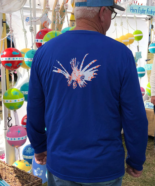Model wearing lionfish royal blue long sleeve dry-fit performance shirt